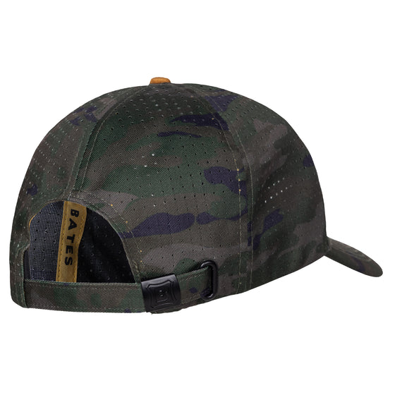 back of camo hat showing adjustable strap and "Bates" interior taping