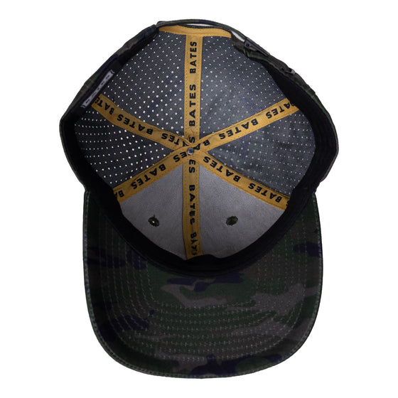 Interior view of camo hat with "BATES" interior taping